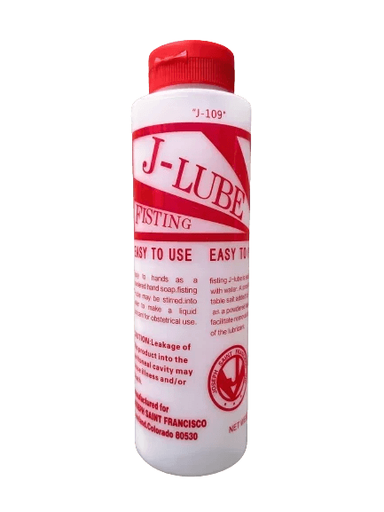 Close-up of control buttons or charging port on fisting j-lube concentrated gel oil for ultimate pleasure