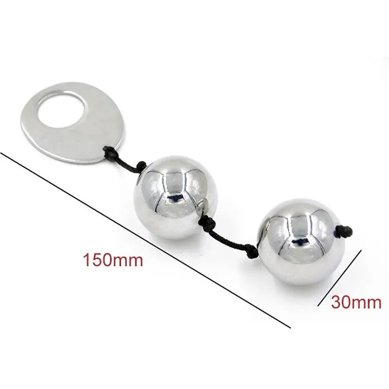 Kegel trainer showing attachment cord or retrieval string