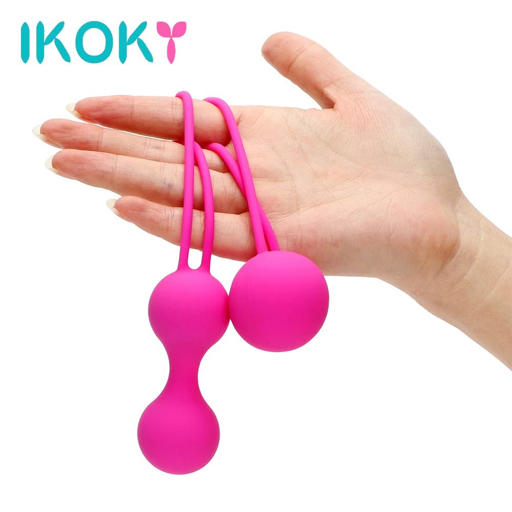 Kegel trainer showing attachment cord or retrieval string
