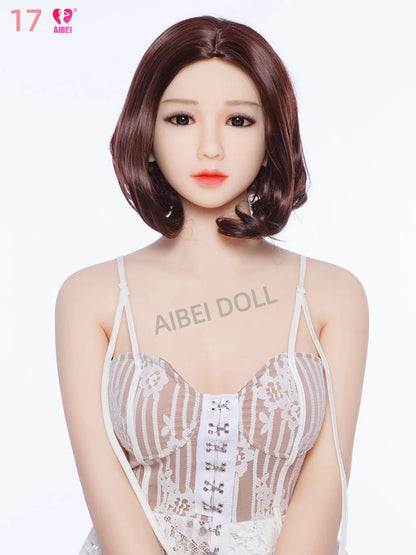 Face and head detail of adult companion figure