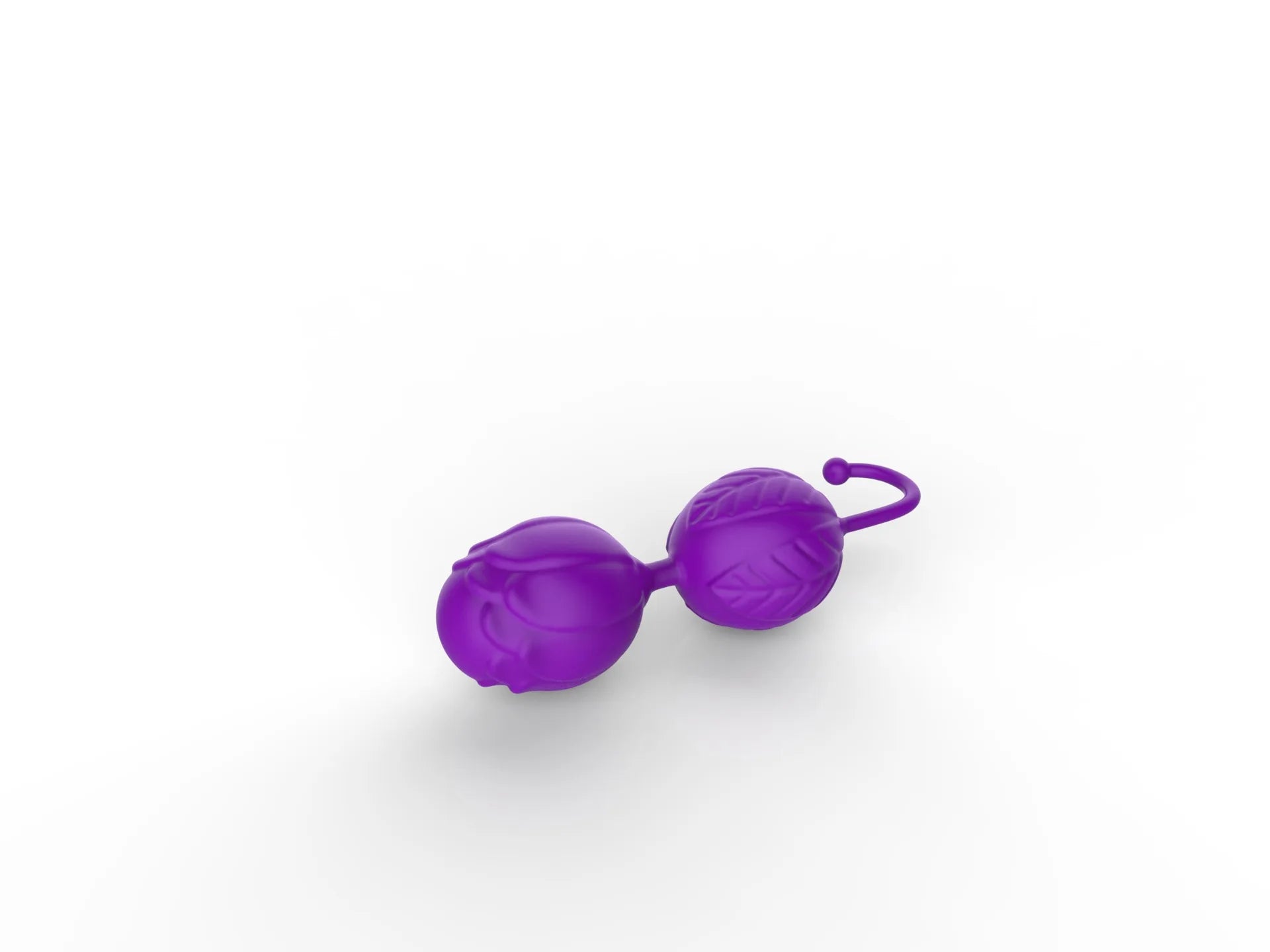 Kegel trainer showing attachment cord or retrieval string