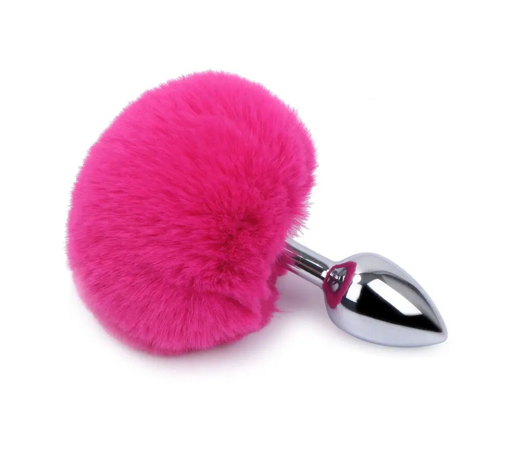 Overhead flat-lay of rabbit tail plug