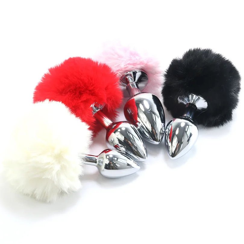 Close-up of soft plush rabbit tail on metal base
