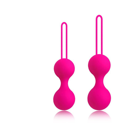 Kegel trainer showing attachment cord or retrieval string