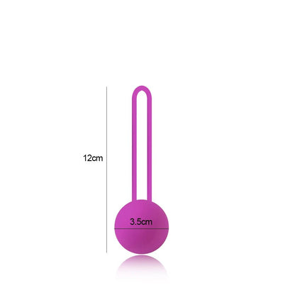 Kegel trainer showing attachment cord or retrieval string