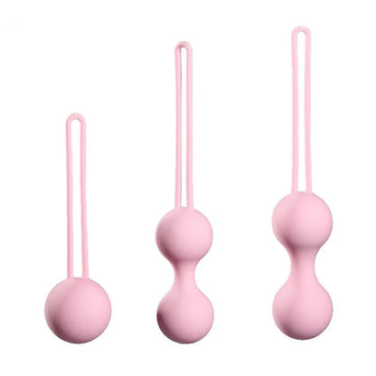 Kegel trainer showing attachment cord or retrieval string