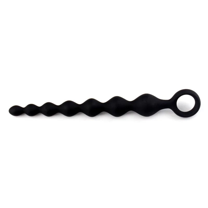 Close-up of bead sizing along 20cm silicone string