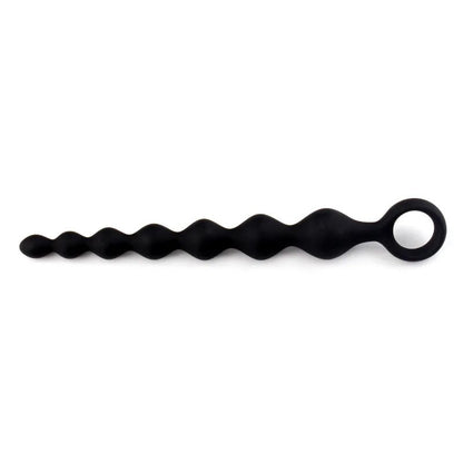 Close-up of bead sizing along 20cm silicone string