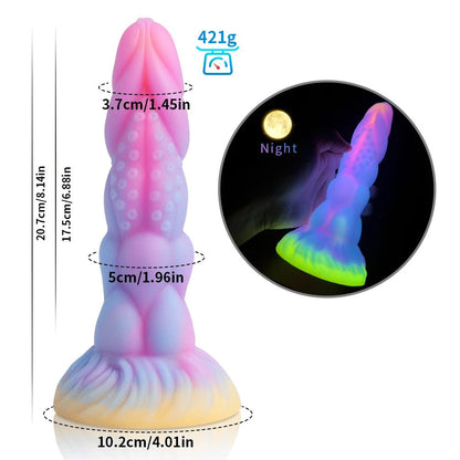 Lifestyle or context shot of dark glowing toy for woman with suction cup fun play