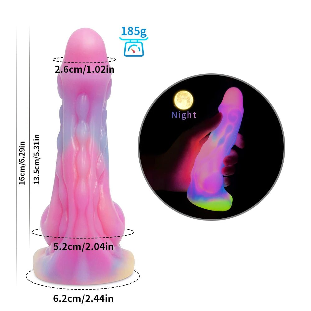 Lifestyle or context shot of dark glowing toy for woman with suction cup fun play