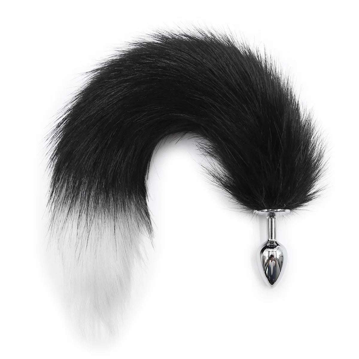 Small fox tail plug beside ruler for scale