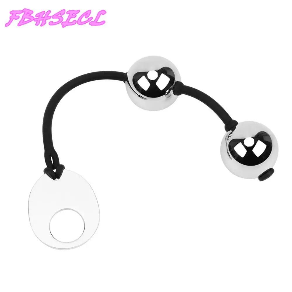 Kegel trainer showing attachment cord or retrieval string