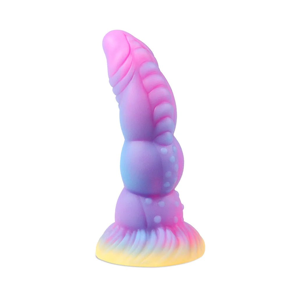 Rear or angled view of dark glowing toy for woman with suction cup fun play