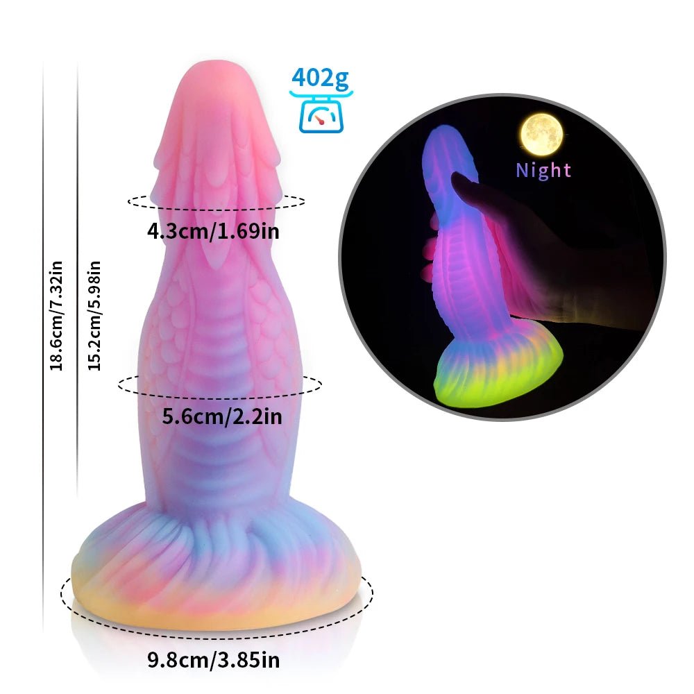 Packaging and accessories included with dark glowing toy for woman with suction cup fun play