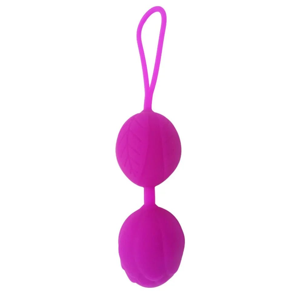 Kegel trainer showing attachment cord or retrieval string