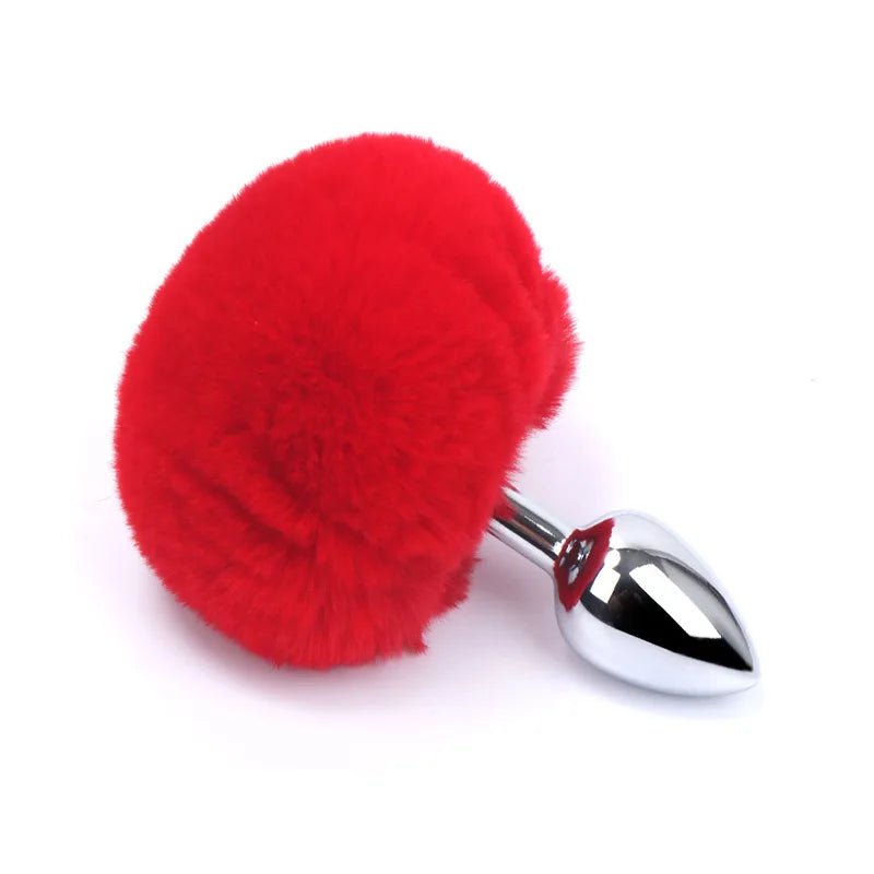 Rabbit tail plug alongside matching accessories