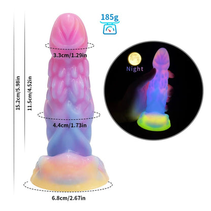 Side profile of dark glowing toy for woman with suction cup fun play showing shape and proportions