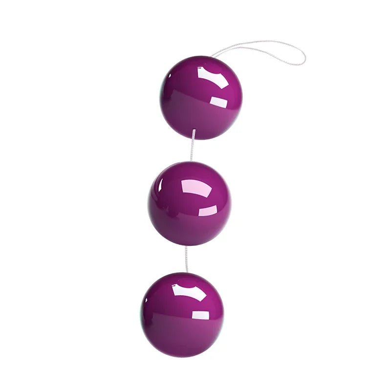 Kegel trainer showing attachment cord or retrieval string