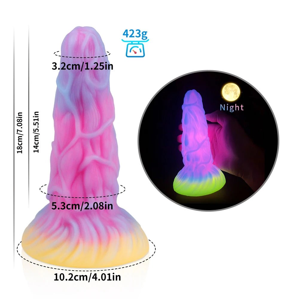 Rear or angled view of dark glowing toy for woman with suction cup fun play